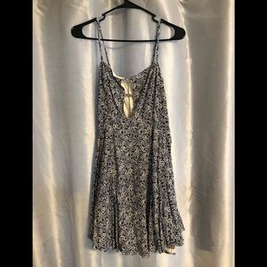 Blue and cream patterned flowy dress with cutout